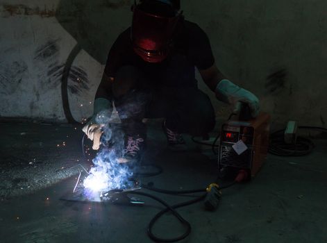 worker welding steel .