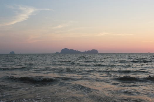 Petra Island view from Sukorn Island in evening