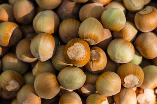 A basket of toasted hazelnuts inviting