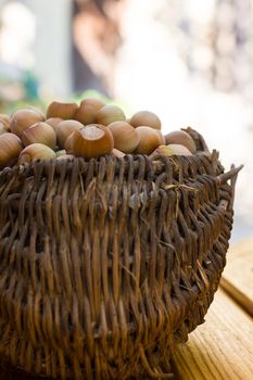 A basket of toasted hazelnuts inviting