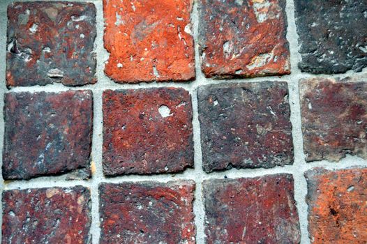 Rows of old red brick used as pavement