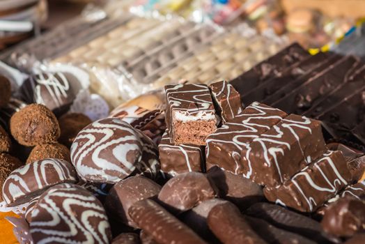 delicious mouthwatering chocolates on the counter outdoors