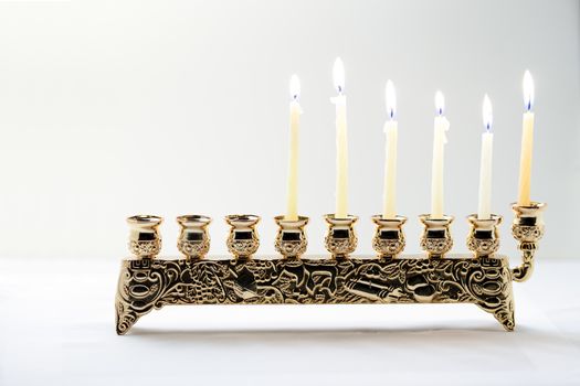 The Symbols of Hanukkah - nine-branched mehorah Hanukiah