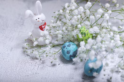 Easter symbols including flowers eggs and bunny