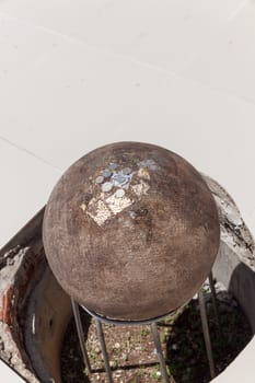 Some sacred marker spheres through ceremony (LUUK NIMIT) need to be buried in the temple compound around church temple in Buddhism. Thailand.