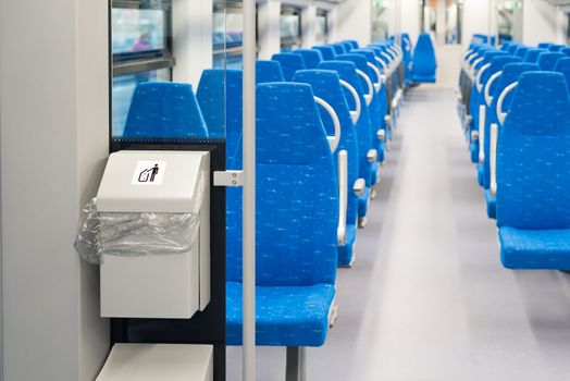 Garbage container in the electric train in Moscow, Russia
