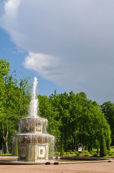 PETERHOF, SAINT PETERSBURG, RUSSIA - JUNE 06, 2014: Fountain in in the Upper Park in Peterhof, St Petersburg, Russia on June 06, 2014. Peterhof palace was included in the UNESCO World Heritage List