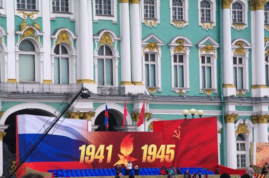 ST. PETERSBURG, RUSSIA - MAI 09, 2014: Flags on Palace Square on the Alexander place on day of victory, in Saint Petersburg, Russia