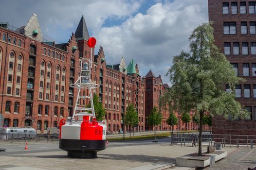 HAMBURG, GERMANY - JULY 18.2016: Famous Speicherstadt warehouse district with blue sky and clouds