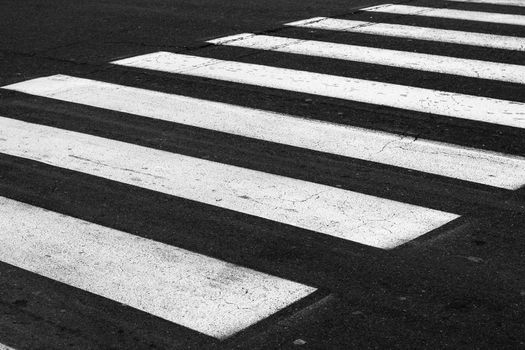 White painted pedestrian crossing on the road.