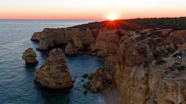 Aerial from Praia da Marinha in the Algarve Portugal at sunset