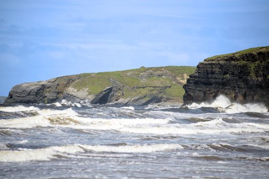 waves and cliffs on the wild atlantic way in Ballybunion county Kerry Ireland