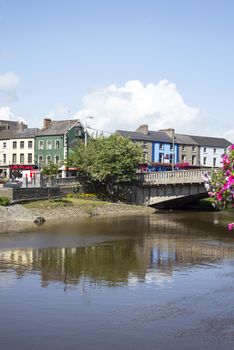 kilkenny town and bridge in reflection on the river nore in ireland