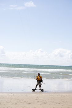 kite boarder on beautiful sandy beach in ballybunion county kerry ireland