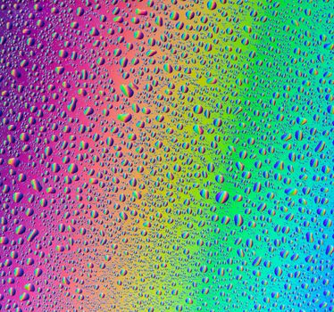 abstract background with water drops on multicolored surface