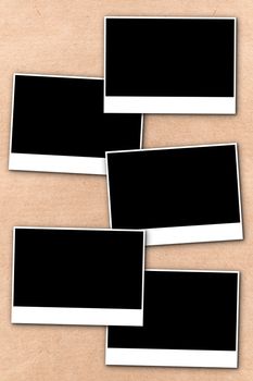 empty photographs on a background beige paper texture