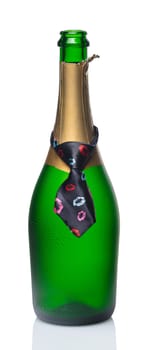 bottle of champagne in tie on a white background