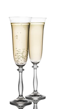 glass of champagne closeup on white background