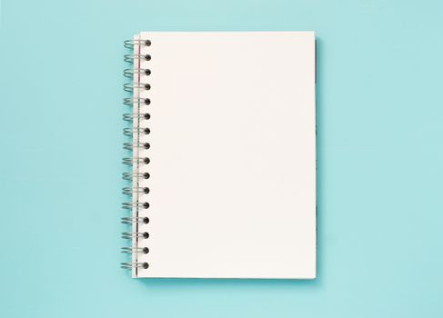 Top view of blank note paper blue wood table for background