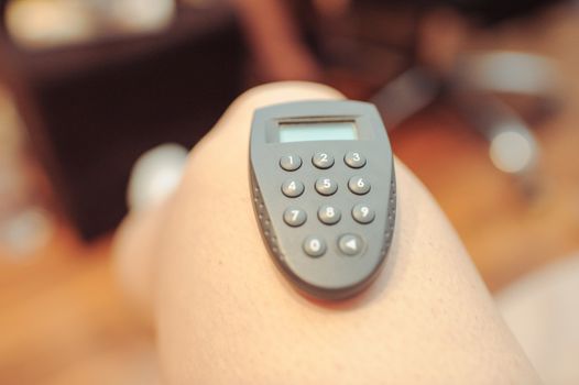 Security net banking token close up on female leg