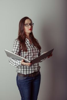 Business woman holding a wide open book