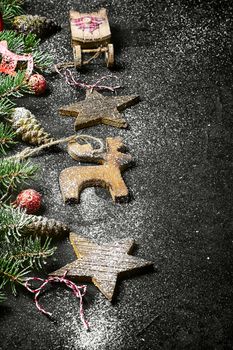 Spruce branches with pinecones and Christmas toy
