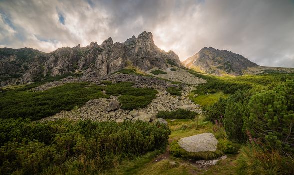 Mountain Landscape with Dramatic Glowing Sky. Mlynicka Valley, High Tatra, Slovakia.