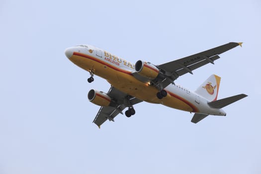 BANGKOK THAILAND - MAY25 : passenger plane of Bhutan Airlines prepare to landing on Suavarnbhumi Airport  on may25,2014 in Bangkok Thailand 