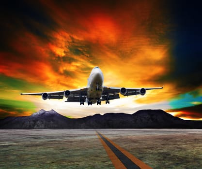 jet plane flying over runways and beautiful dusky sky with copy space use for air transport ,journey and traveling industry business 