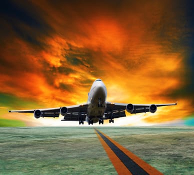 jet plane flying over runways and beautiful dusky sky with copy space use for air transport ,journey and traveling industry business 