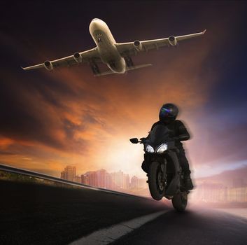 young man riding motorcycle on asphalt highways road with high speed and jet plane flying over sky  