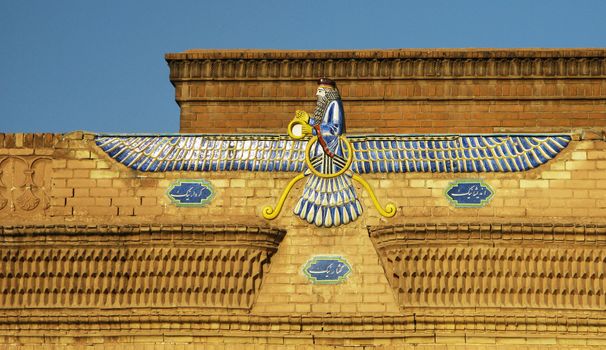 Faravahar, zoroastrian symbol on the temple wall, Yazd, Iran