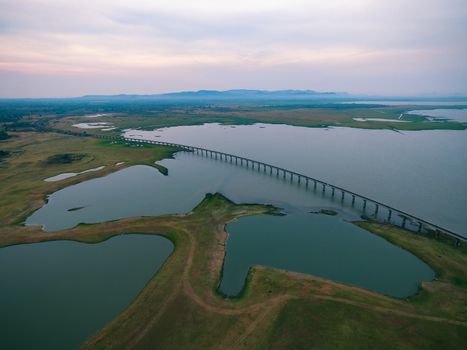 aerial view of railway crossing pasak dam in lopburi central of thailand