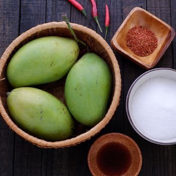 Vietnamese fruit, green mango cut in slice, a popular tropical fruit, rich vitamin A, vitamin C, collagen, good for health and impulse calcium absorption