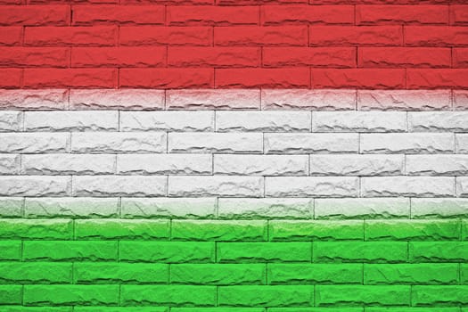 Hungary brick wall background, National flag