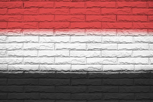 Yemen brick wall background, National flag