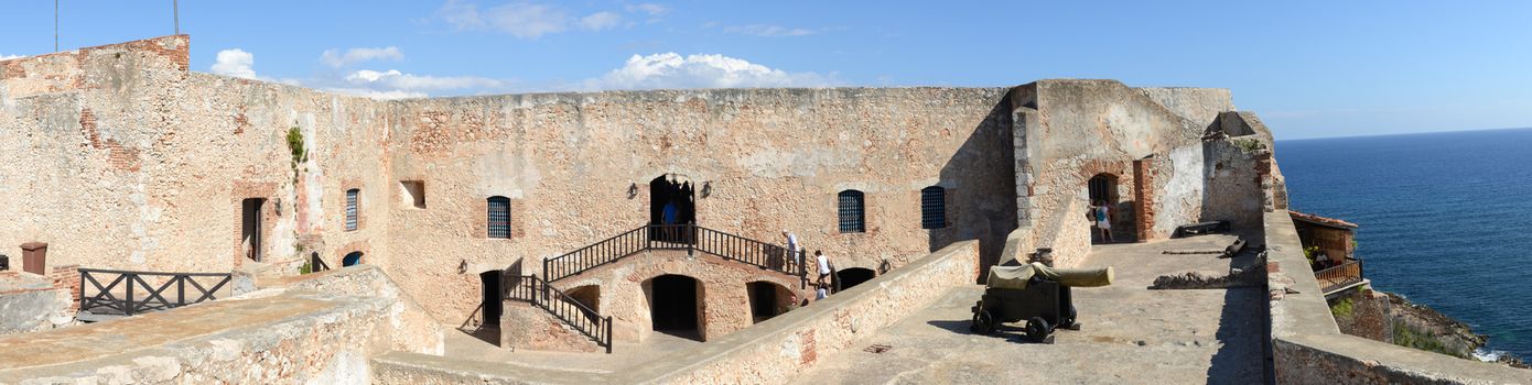 Santiago, Cuba - 14 january 2016: people visiting on walking El Morro castle at Santiago de Cuba, Cuba