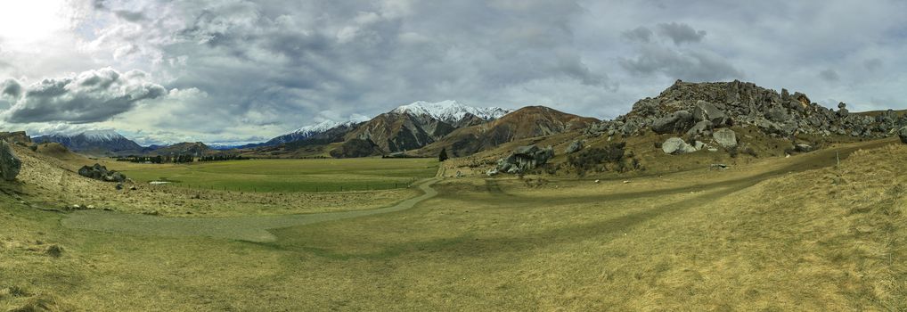 wide angle panorama landscape of castle hill mountain and land slove in arthur pass route south island new zealand