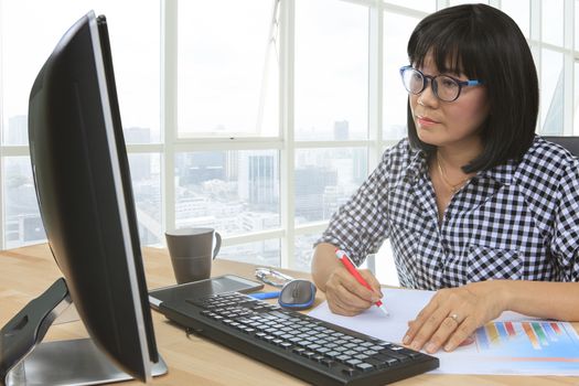 working woman writing paper message on office table use for people office lifestyle