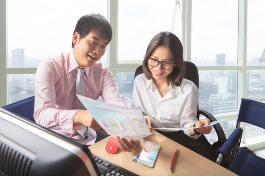 younger man and woman meeting in office working table scene for people business lifestyle