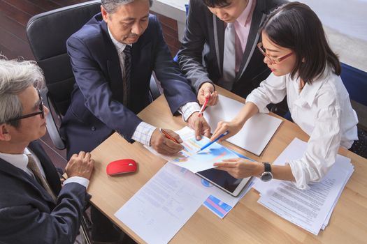 business  team work asian people report analysis  meeting discussing project planing shot over office working table