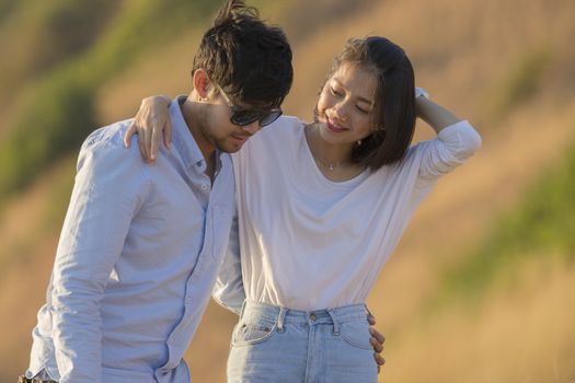 couples younger asian man and woman relaxing time on vacation destination traveling