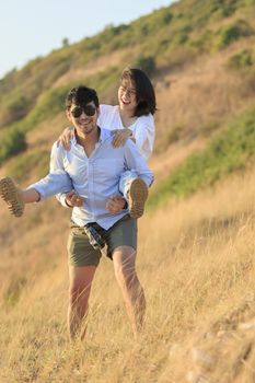 couples younger asian man and woman relaxing time on vacation destination traveling