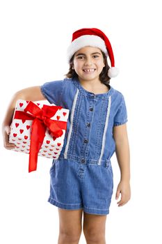 Young girl holding a a Christmas present