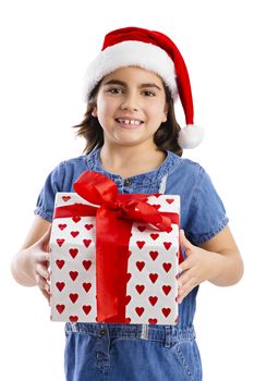 Young girl holding a a Christmas present