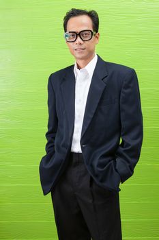 asian business man wearing western suit standing with relaxing emotion