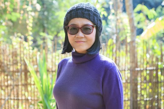 portrait head shot of 49s years old thai woman with happiness smiling face