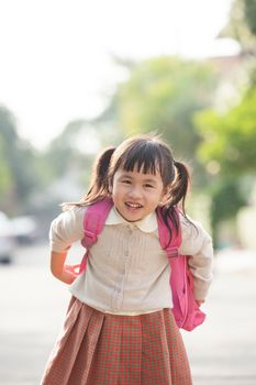 asian student backpacking school bag with smiling face happiness emotion