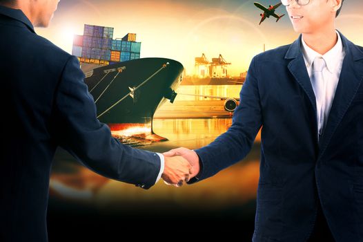 business man shaking hand ,success of agreement solution goal with shipping transport and commercial logistic industry background