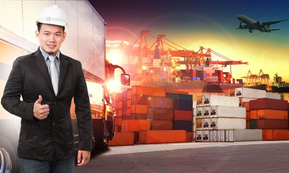 business man and comercial ship with container on port use for import ,export and shipping logistic industry service and air cargo